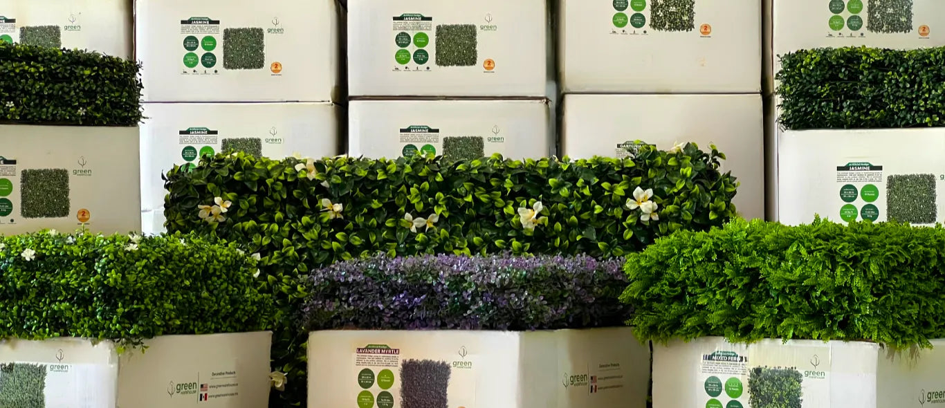 Boxes of artificial hedge panels with greenery wall samples for nationwide distribution