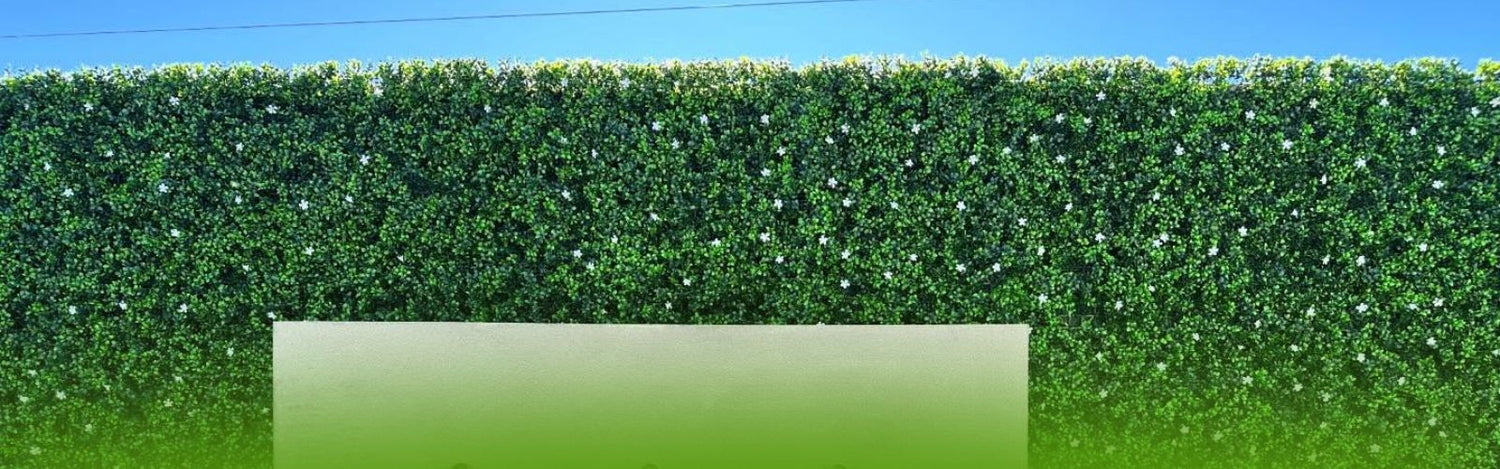 What is an artificial green wall and what problems does it solve?