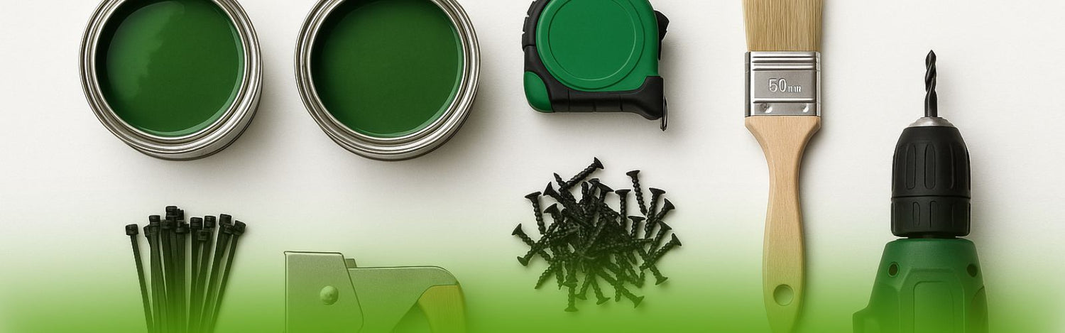 Professional artificial green wall installation tools including drill, zip ties, nails, measuring tape, staple gun, and green paint cans neatly arranged on a work surface