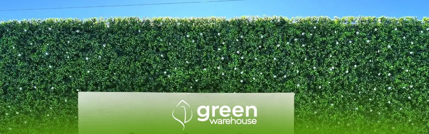 What is an artificial green wall and what problems does it solve?