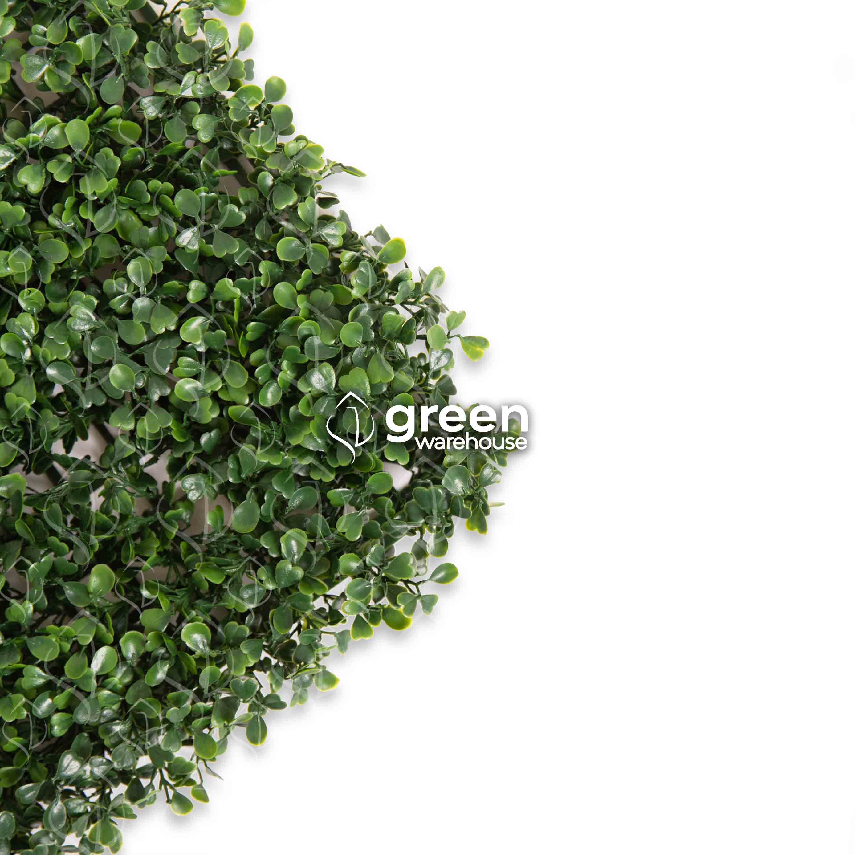 Boxwood Artificial Foliage is the best option to combine with other styles in a custom Green Wall design, as it has a small, dark green leaf and a pleasant texture that gives it a uniform and harmonious appearance with other foliage styles.