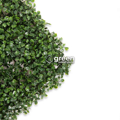 Boxwood Artificial Foliage is the best option to combine with other styles in a custom Green Wall design, as it has a small, dark green leaf and a pleasant texture that gives it a uniform and harmonious appearance with other foliage styles.