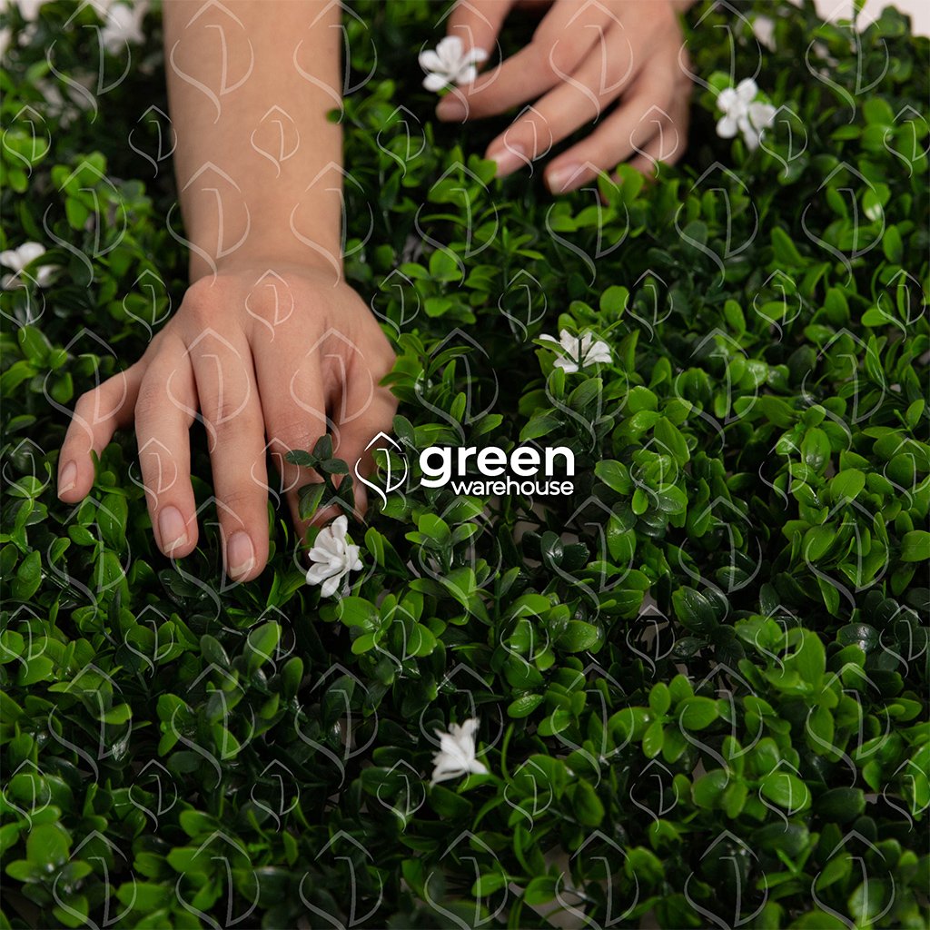 The Artificial Myrtle Flower Foliage has small dark green leaves with bright green tips. The peculiarity of this model is its white flowers that add another fresh and original feature.