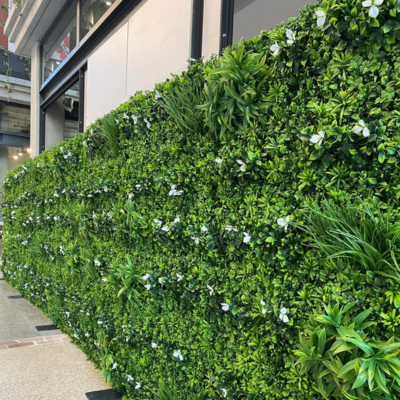 Artificial vertical garden wall Black Forest by Green Warehouse, 40"x40" artificial living wall panel with realistic foliage and white flowers.
