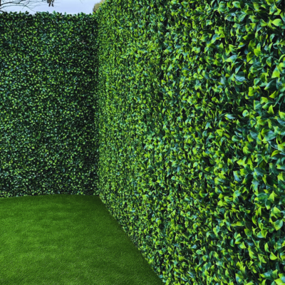 Outdoor Gardenia Leaf Artificial Hedge Panels 40"x40" by Green Warehouse, artificial green wall for bardas, fences, and vertical surfaces with dense foliage.
